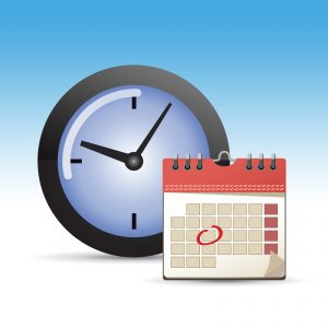 A clock at 10:05 AM behind a nondescript calendar with a date circled in the middle