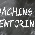 "Coaching & Mentoring" written in white